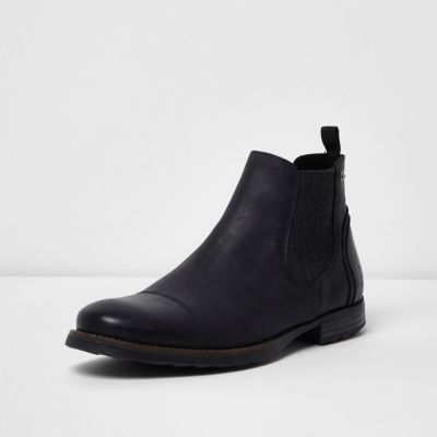 Black leather distressed Chelsea boots
